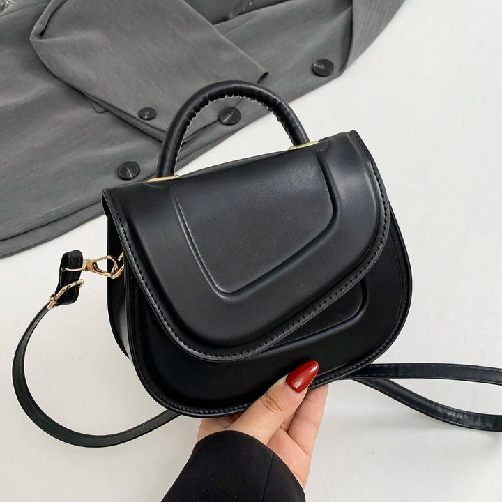 Novessa | Luxe Statement Minimalist Saddle Bag