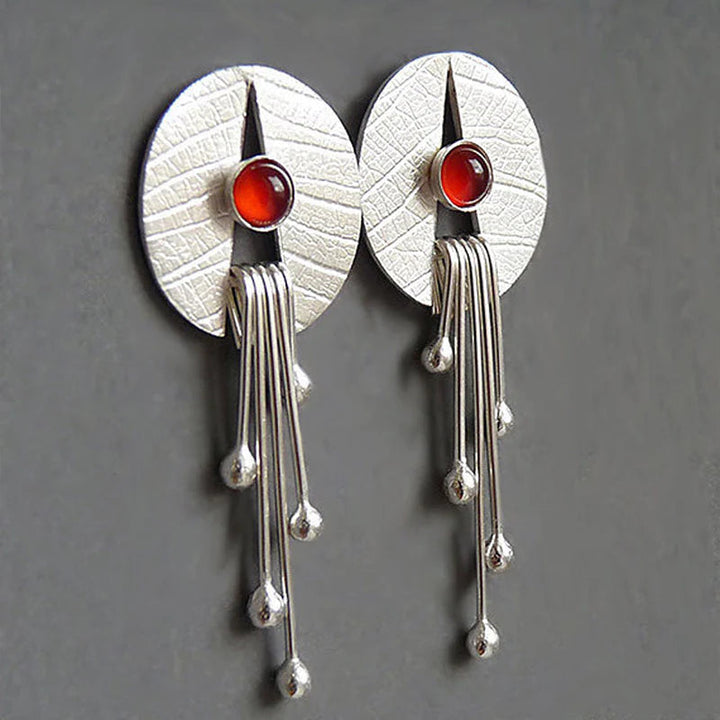 Caredad | Hollow red stone hanging earrings