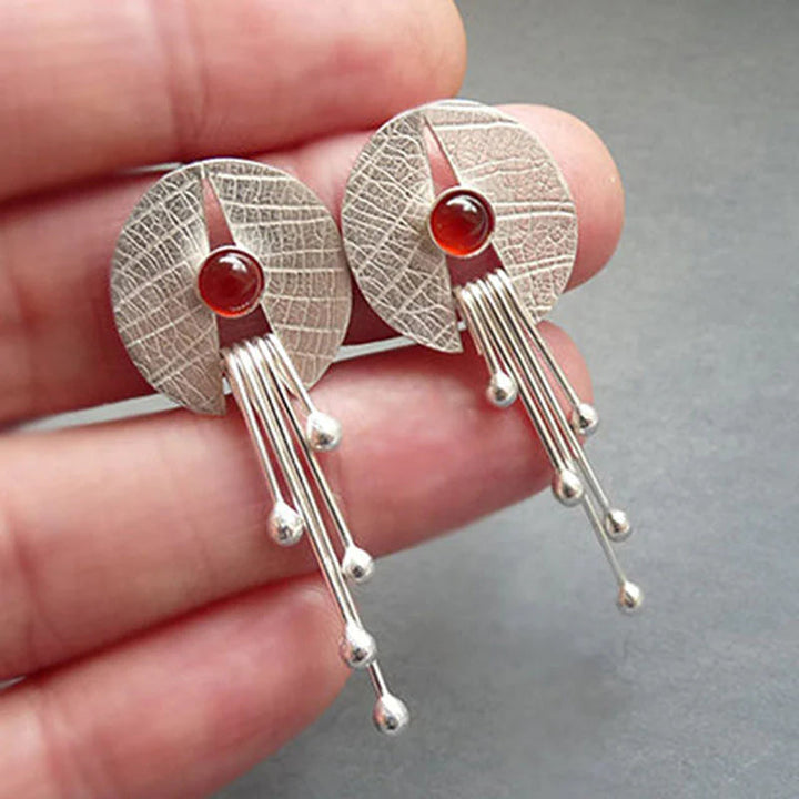 Caredad | Hollow red stone hanging earrings