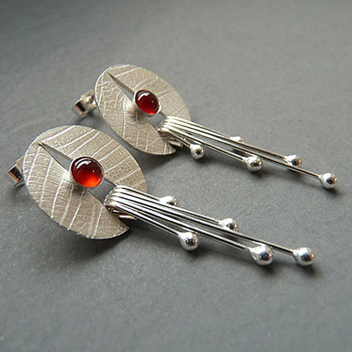 Caredad | Hollow red stone hanging earrings